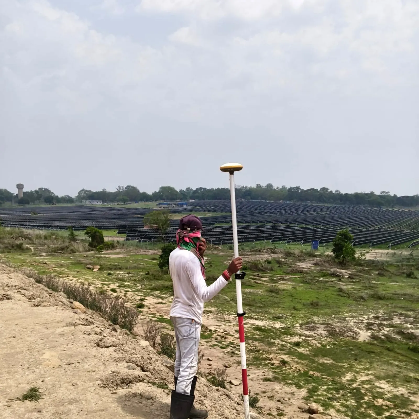 ECAC surveyor conducting a topographical field survey